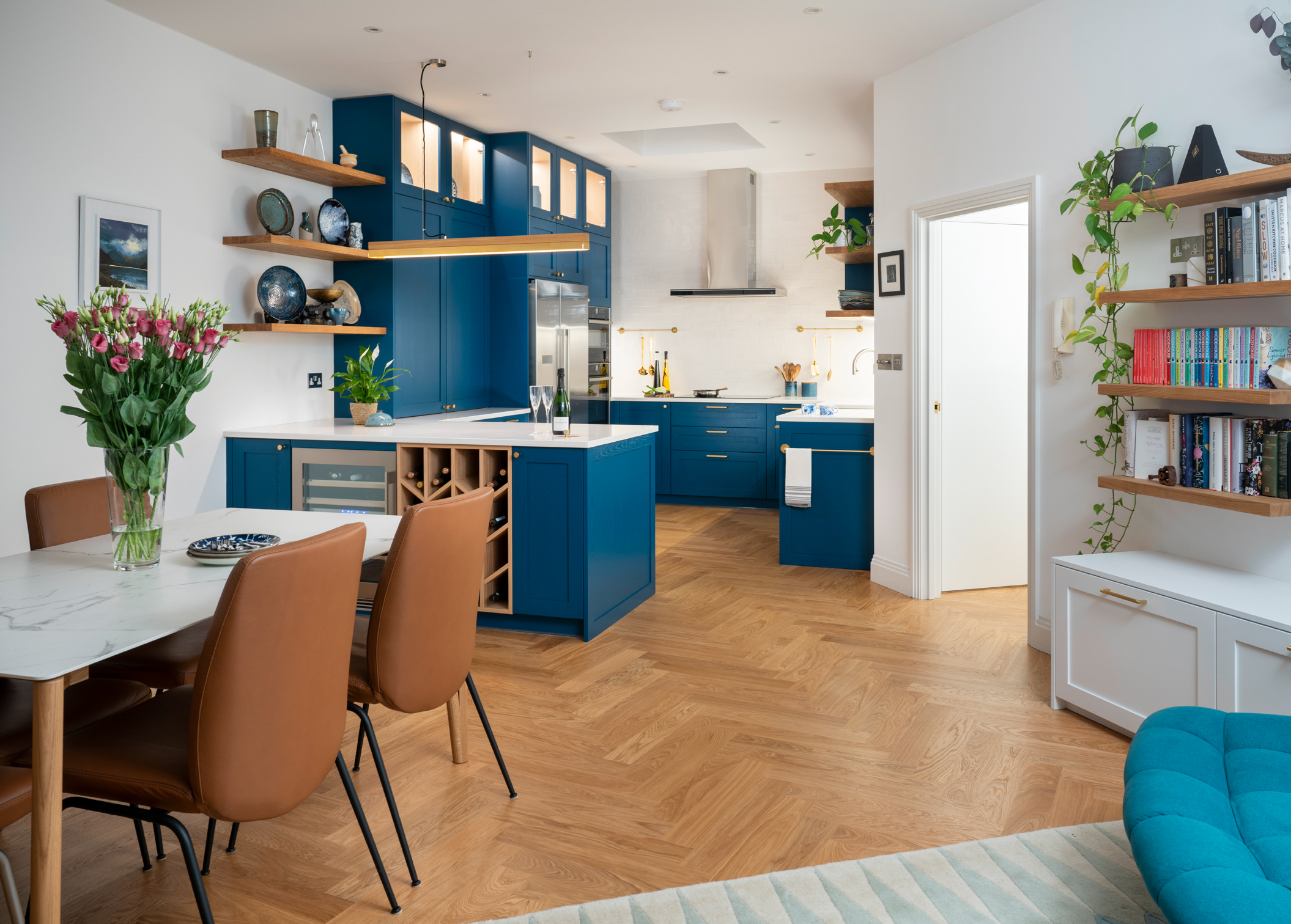 bright blue kitchen open plan